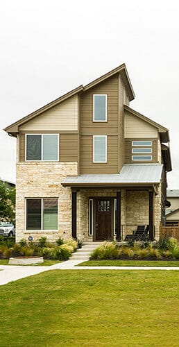 AUSTIN - CIRCA APRIL 2017: Newly constructed homes are ready for sale in a suburb of Austin, Texas.