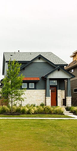 AUSTIN - CIRCA APRIL 2017: Newly constructed homes are ready for sale in a suburb of Austin, Texas.