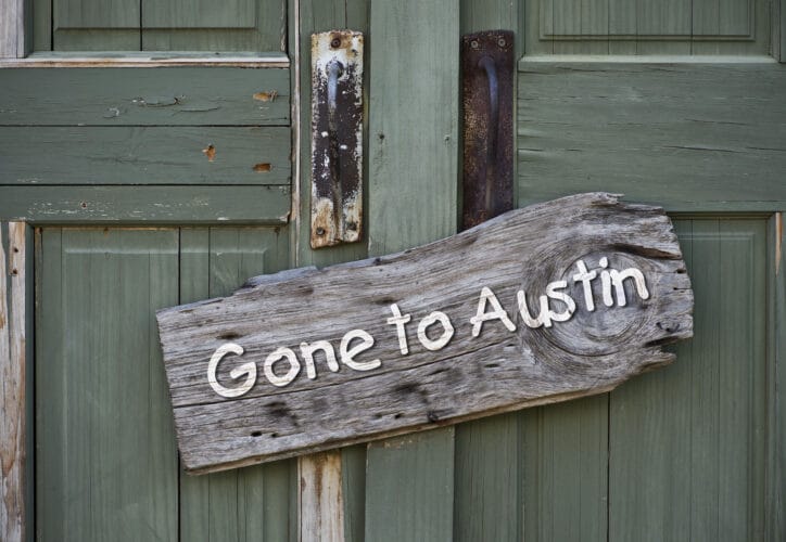 An old gone to Austin, Texas sign.